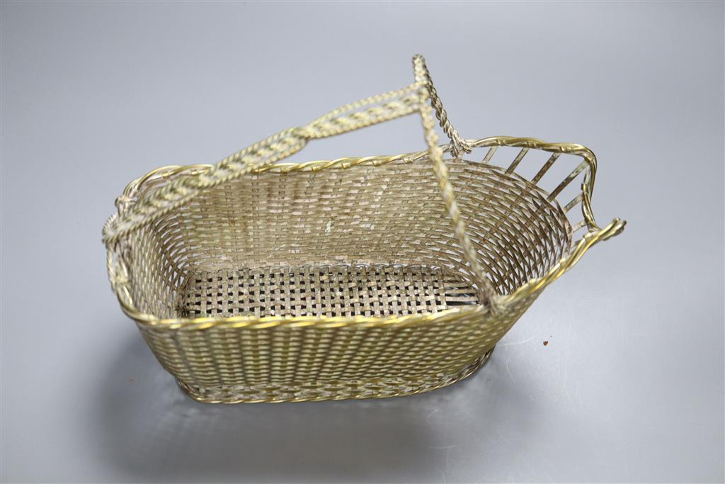 A Christofle silver plated wine basket, length 24cm and a bronze model of a wading bird, on oval marble plinth, 16cm